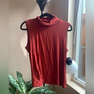 Red mock neck sleeveless blouse